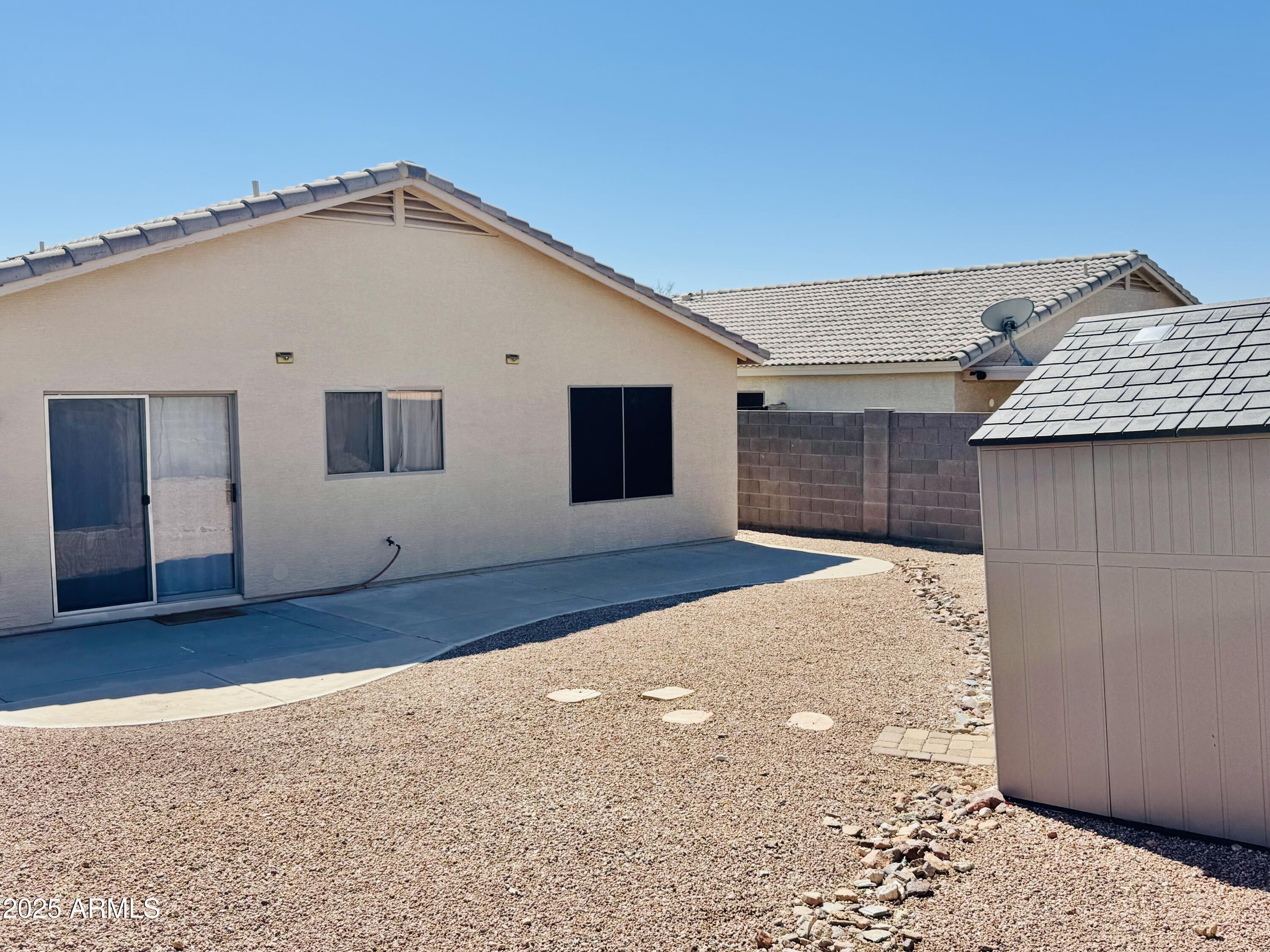 6932 South Russet Sky Way Gold Canyon, AZ 85118 - Photo 34 of 36 a house view with a backyard space
