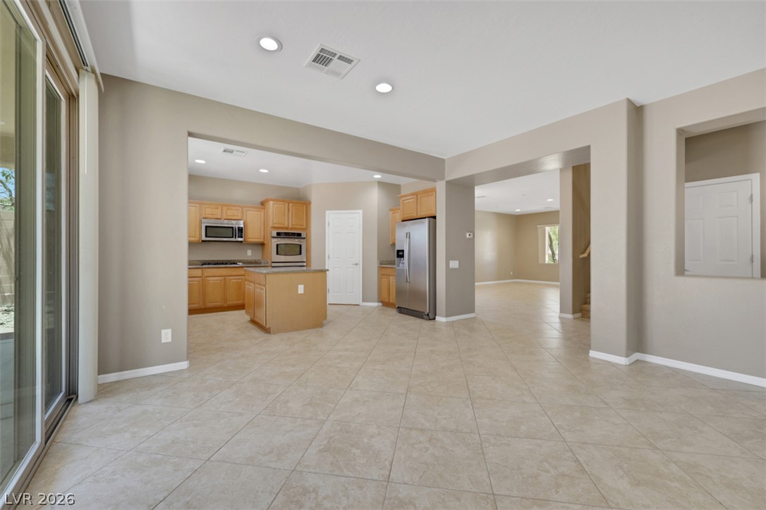 2501 Bechamel Place Henderson, NV 89044 - Photo 10 of 50 A spacious, open-concept kitchen and living area, perfect for entertaining.