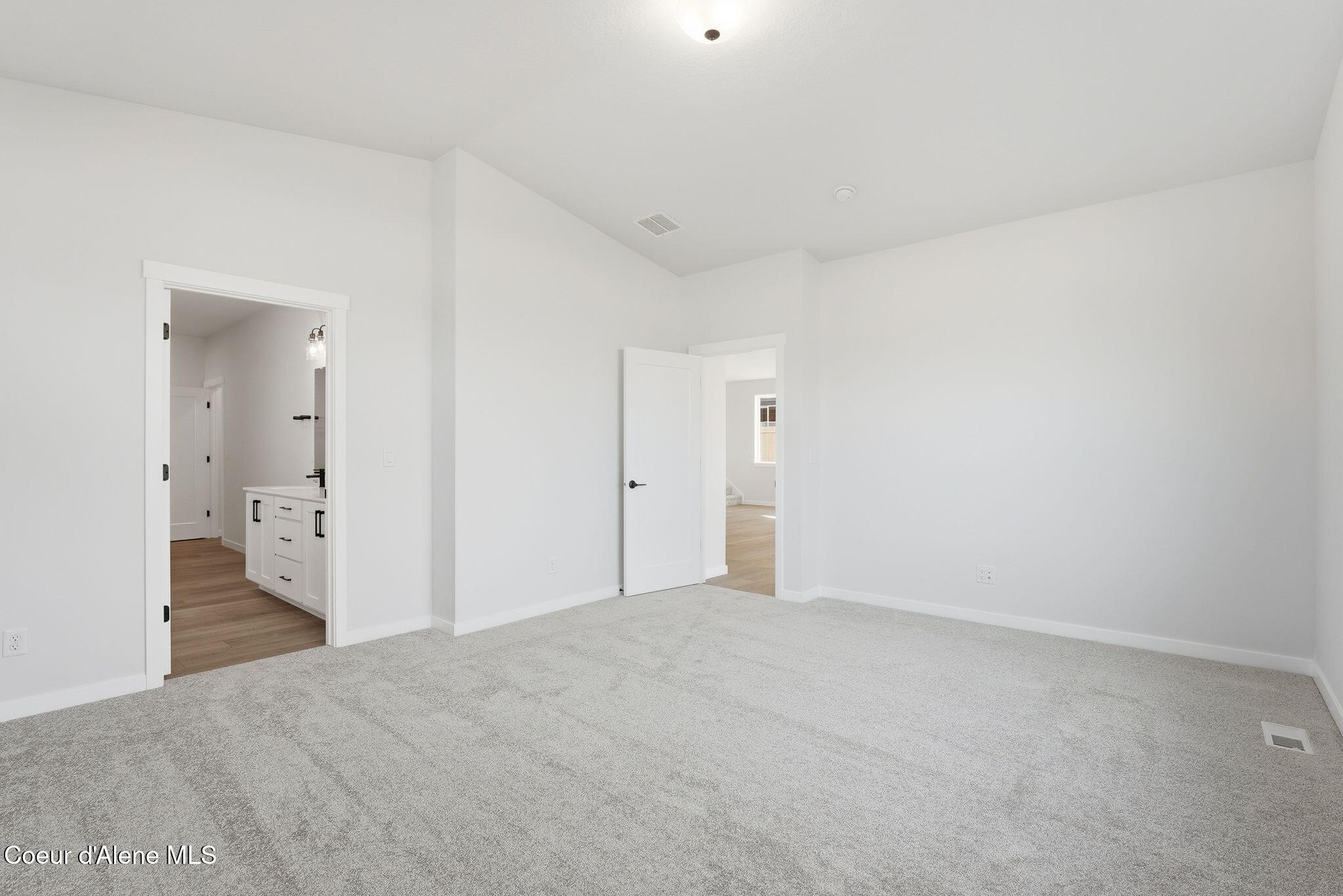 2693 West Victor Loop Coeur D'Alene, ID 83815 - Photo 19 of 52 Primary Bedroom