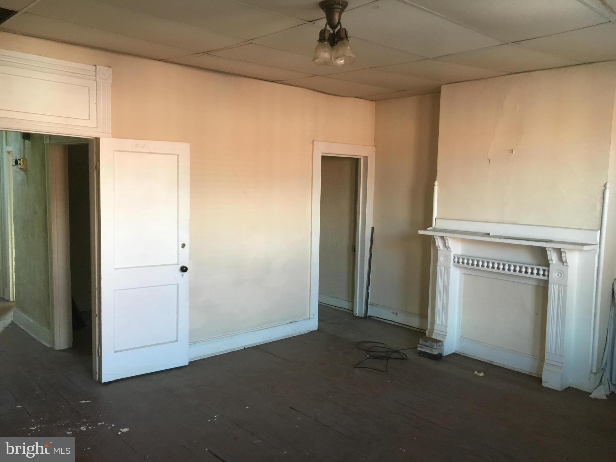 2030 Madison Avenue Baltimore, MD 21217 - Photo 21 of 24 an empty room with windows and closet