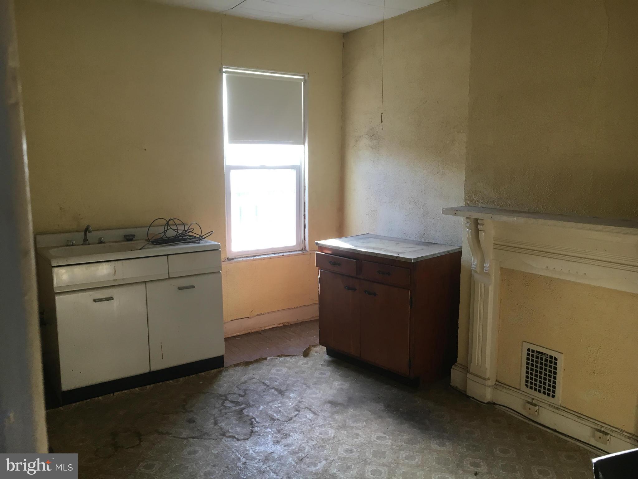 2030 Madison Avenue Baltimore, MD 21217 - Photo 24 of 24 a room with storage and utility