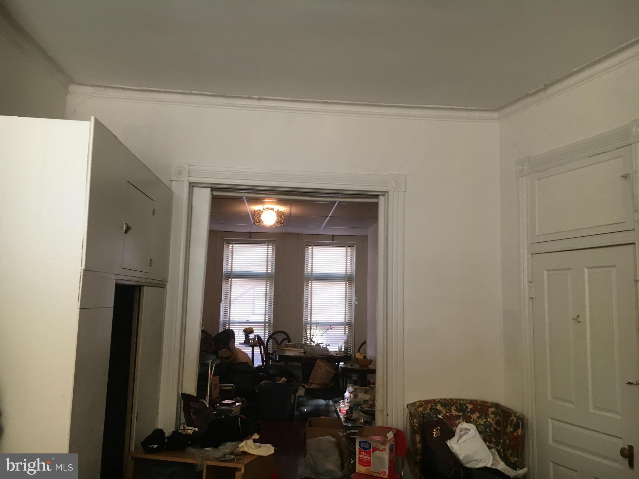 2030 Madison Avenue Baltimore, MD 21217 - Photo 10 of 24 a living room with furniture and a window