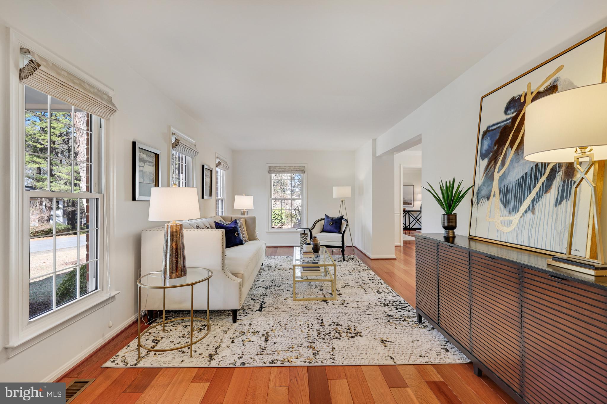 1807 Post Oak Trail Reston, VA 20191 - Photo 7 of 79 The foyer opens to the living room.