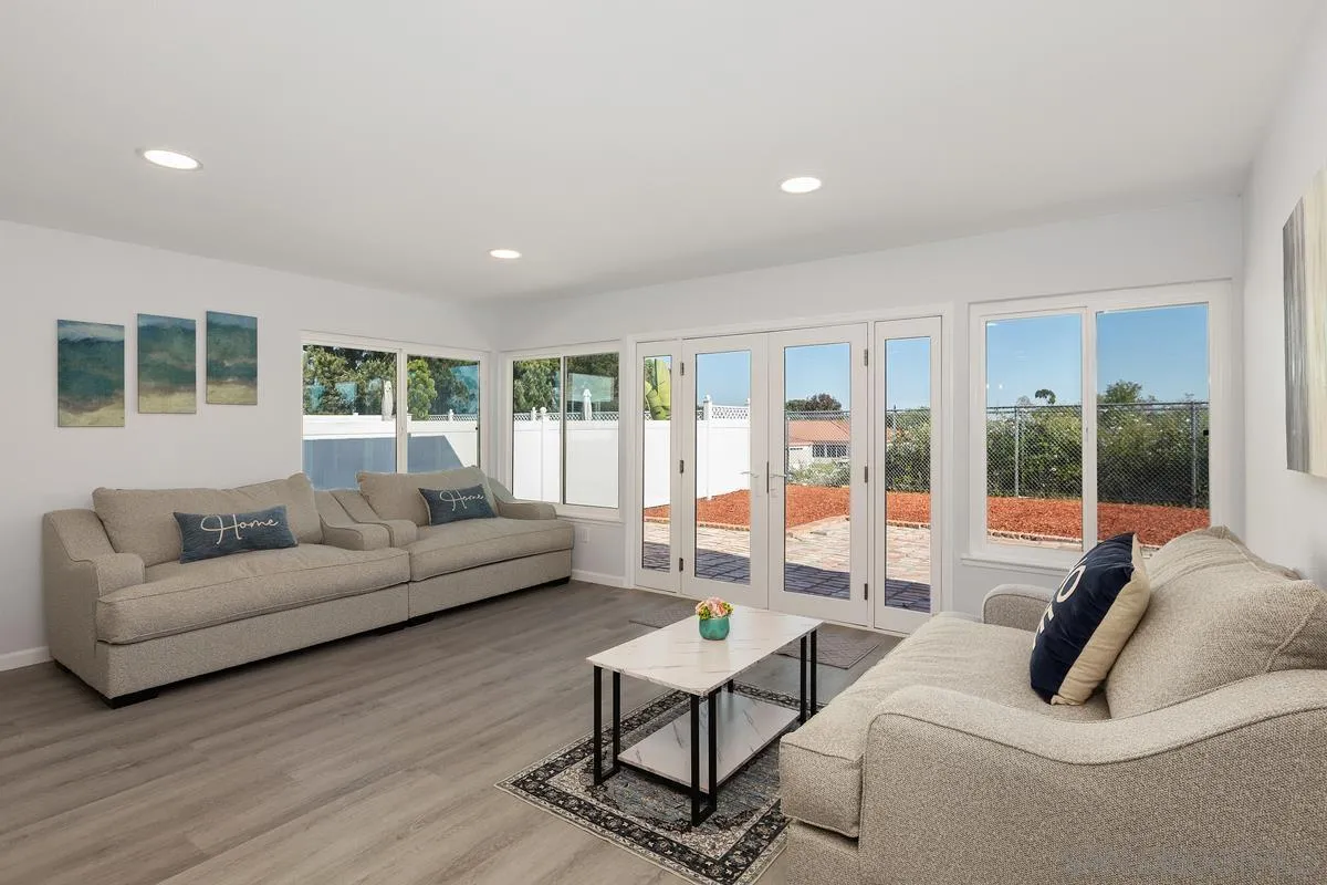1374 Valencia Loop Chula Vista, CA 91910 - Photo 5 of 35 a living room with furniture and a large window
