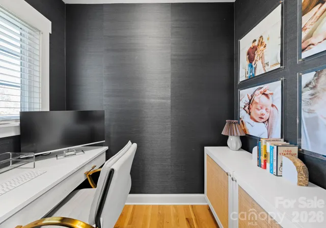 a room with furniture and flat screen tv