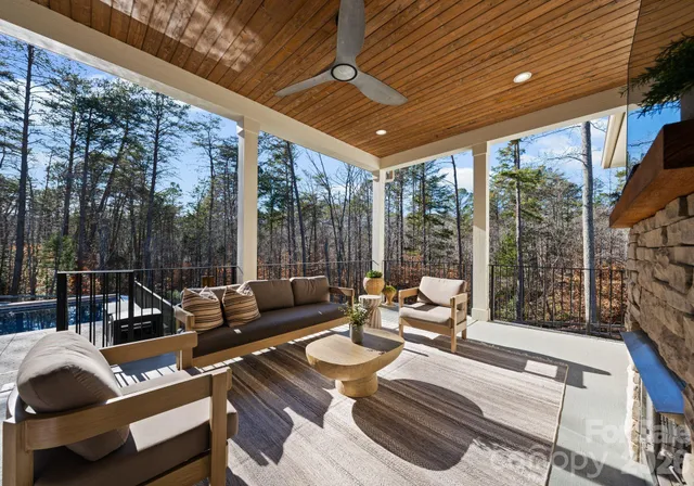 a outdoor space with patio the couches and a dining table with garden view