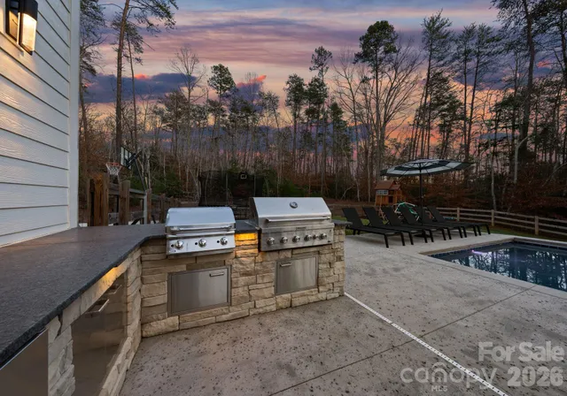 a view of a lake with a yard