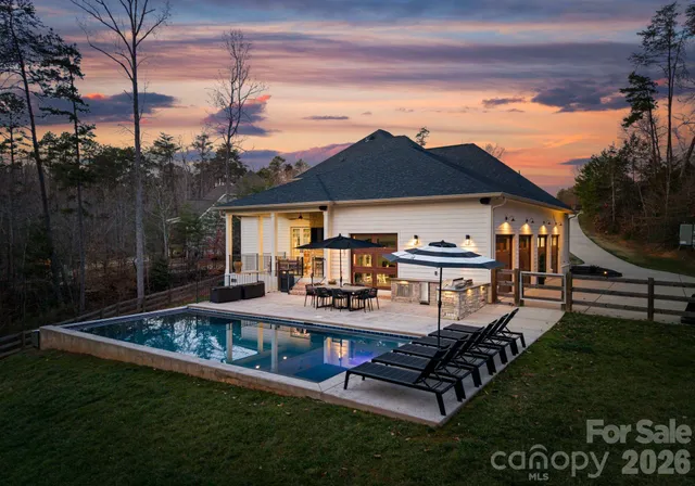 an aerial view of a house with a garden