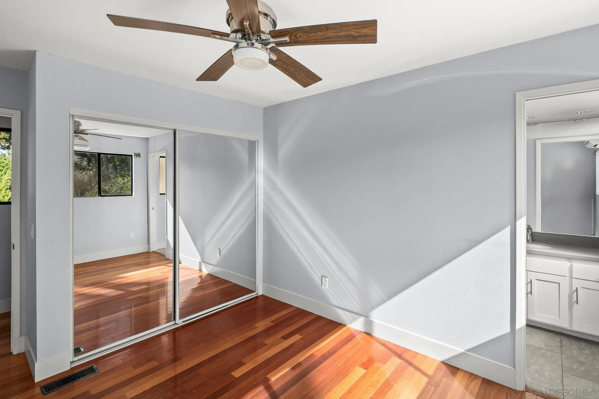 9190 Spice Street La Mesa, CA 91941 - Photo 22 of 44 a view of entryway and hall with wooden floor