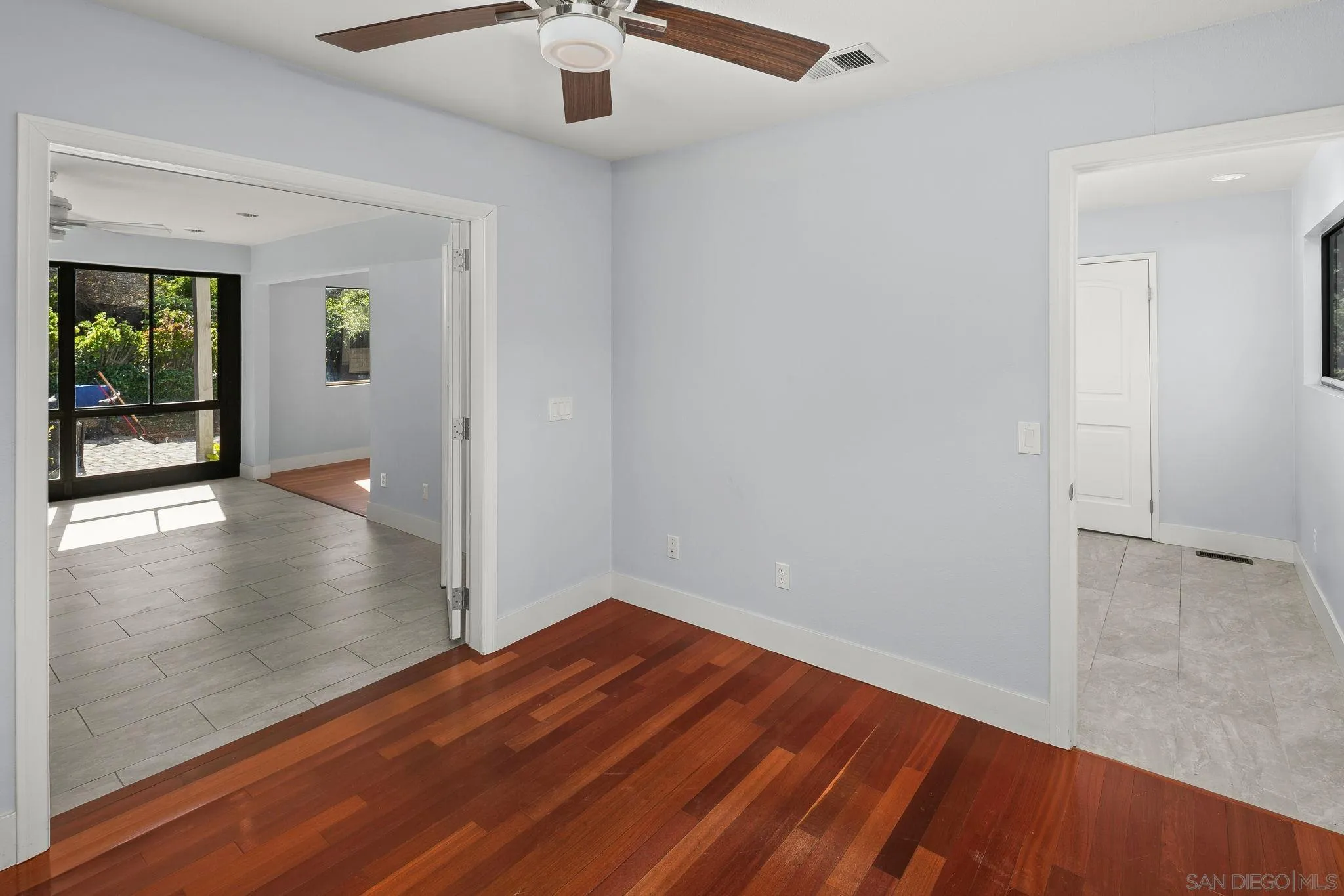 9190 Spice Street La Mesa, CA 91941 - Photo 25 of 44 wooden floor in an empty room with a window