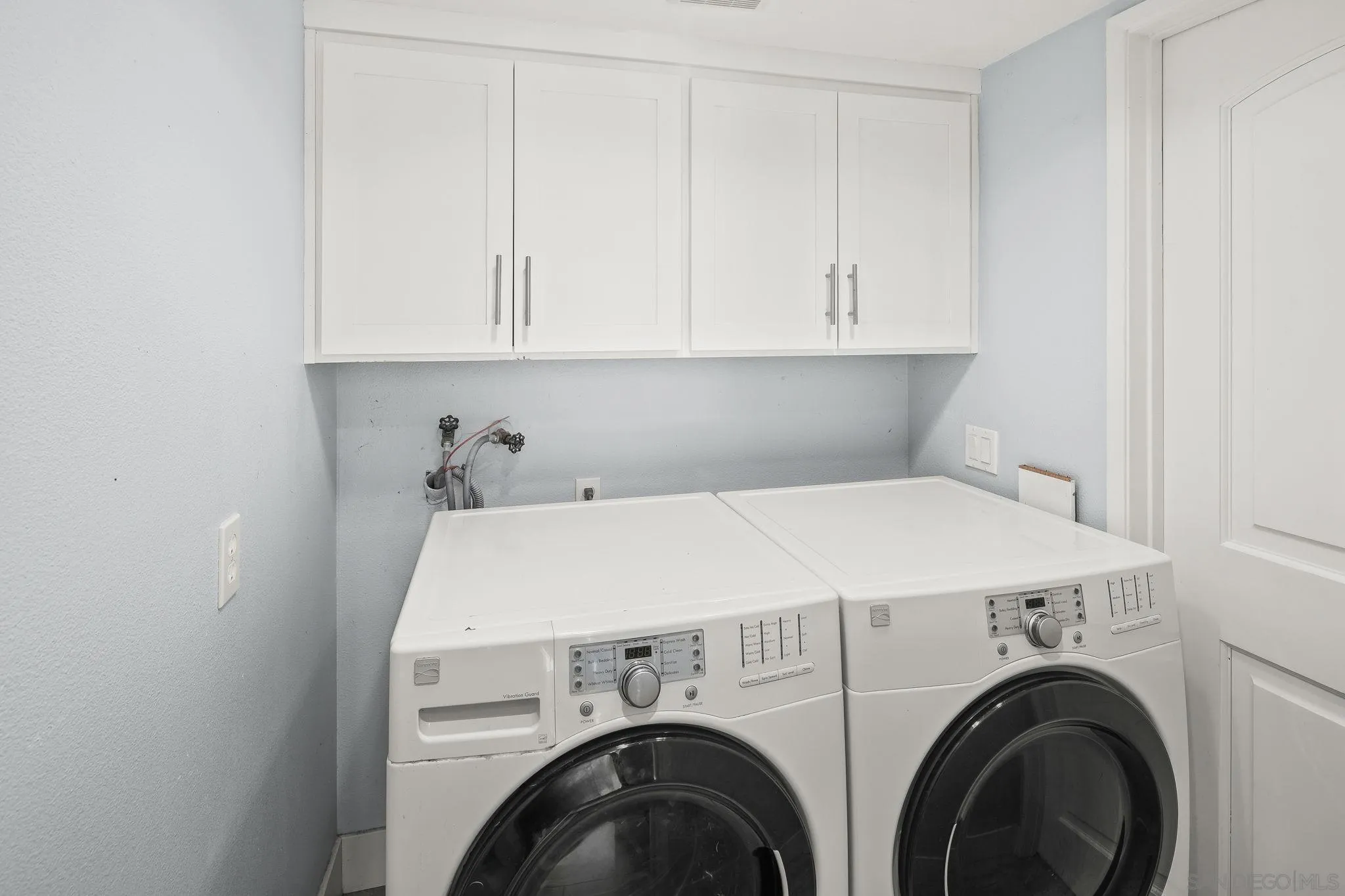 9190 Spice Street La Mesa, CA 91941 - Photo 28 of 44 a utility room with dryer and washer