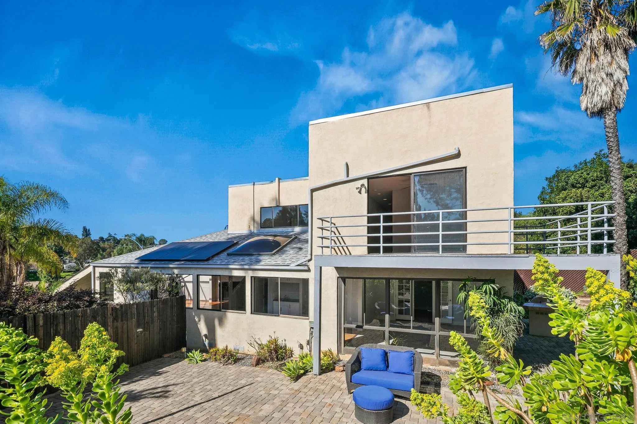 9190 Spice Street La Mesa, CA 91941 - Photo 34 of 44 a front view of a house with plants and garden