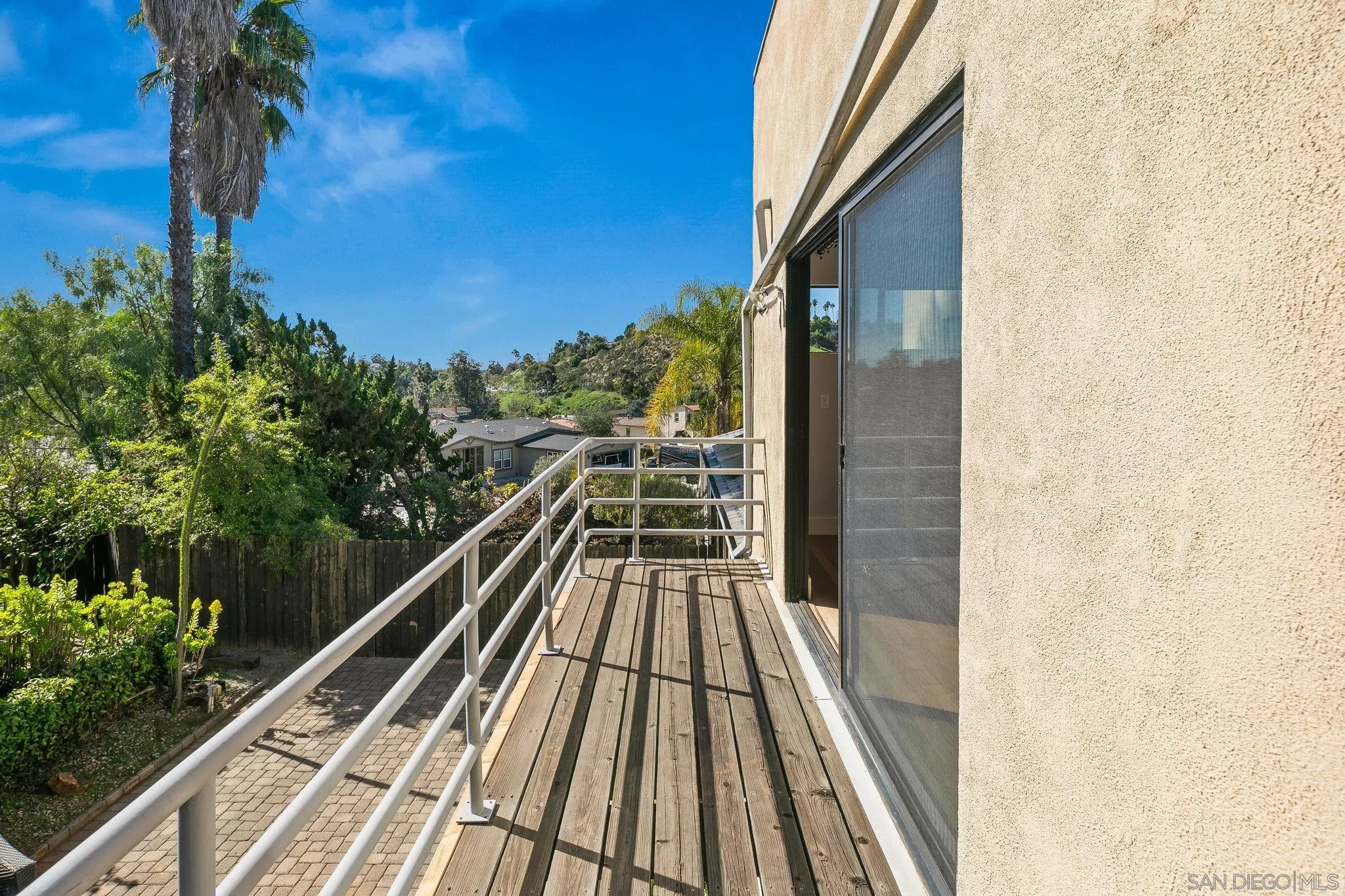 9190 Spice Street La Mesa, CA 91941 - Photo 38 of 44 a view of balcony with wooden floor and fence