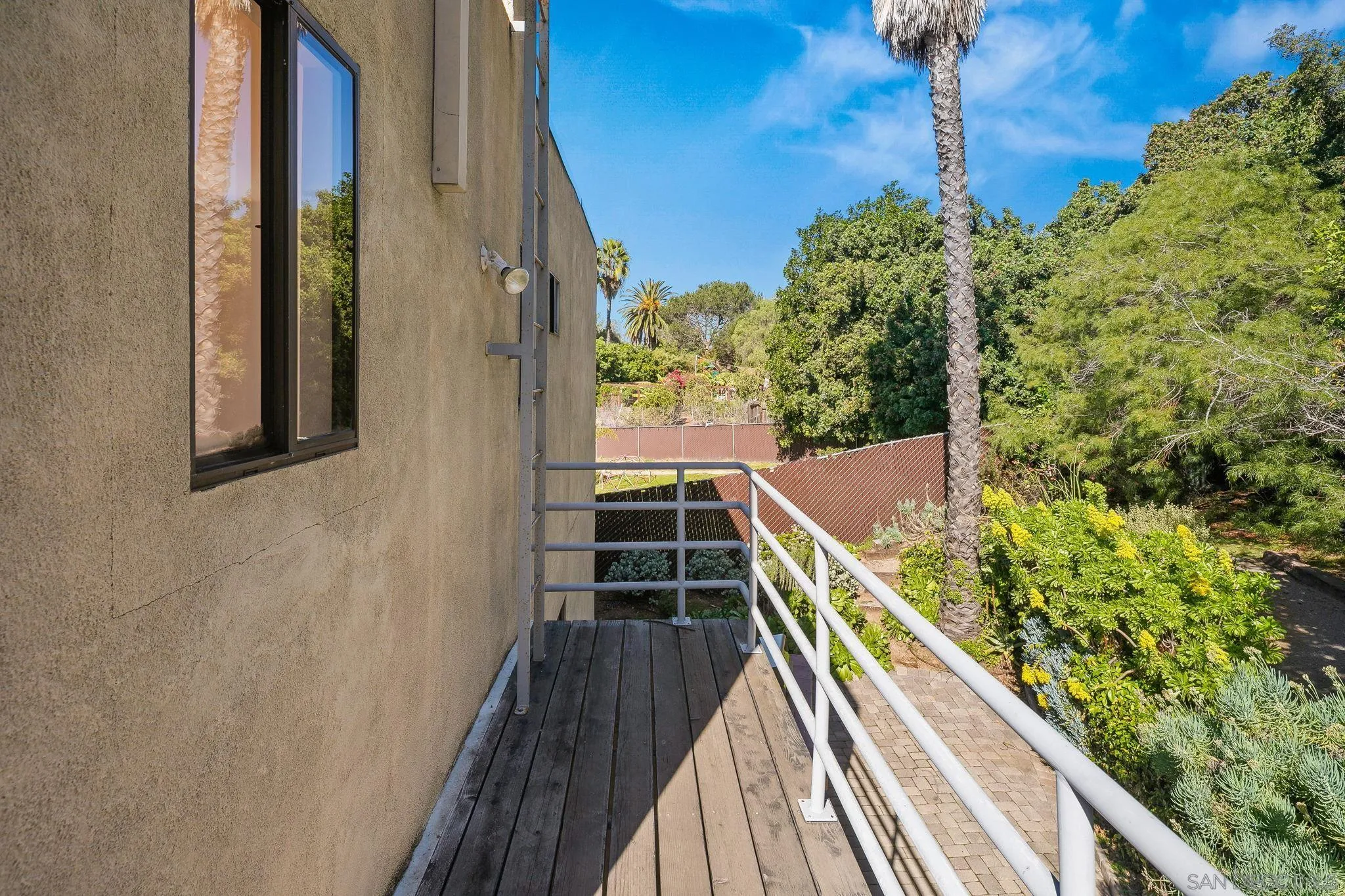 9190 Spice Street La Mesa, CA 91941 - Photo 39 of 44 a view of balcony with wooden floor