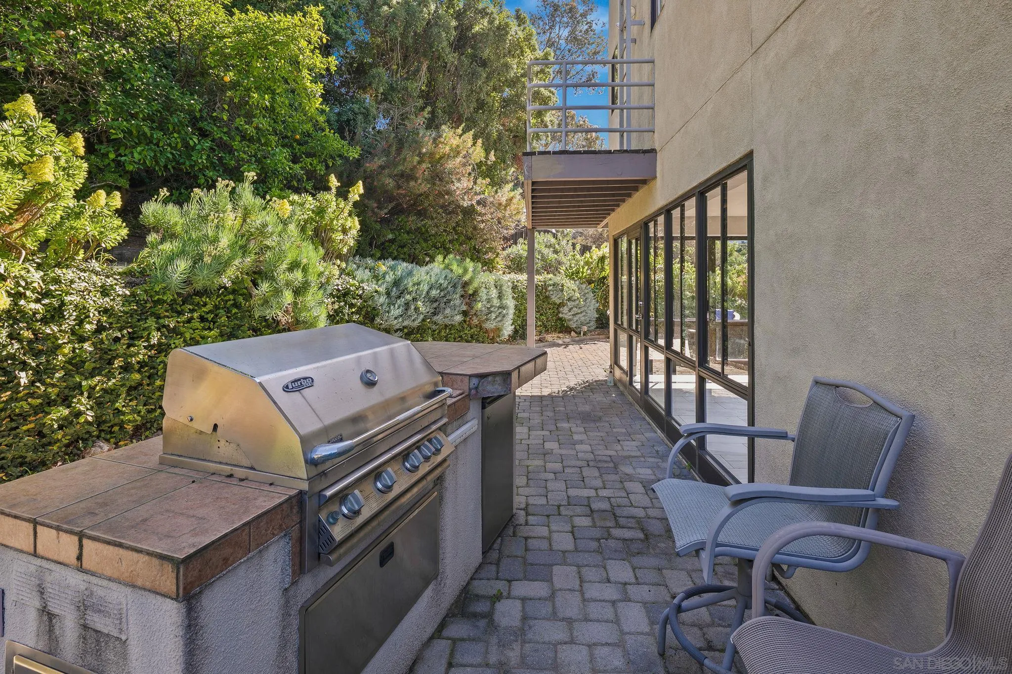 9190 Spice Street La Mesa, CA 91941 - Photo 40 of 44 a view of a patio with a table and chairs