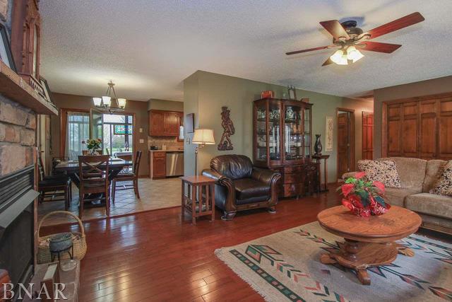 7647 White Oaks Road Clinton, IL 61727 - Photo 3 of 30 a living room with furniture and wooden floor