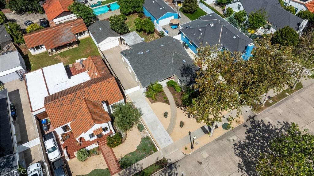 2324 North Riverside Drive Santa Ana, CA 92706 - Photo 48 of 52 an aerial view of a house with a yard and a large tree