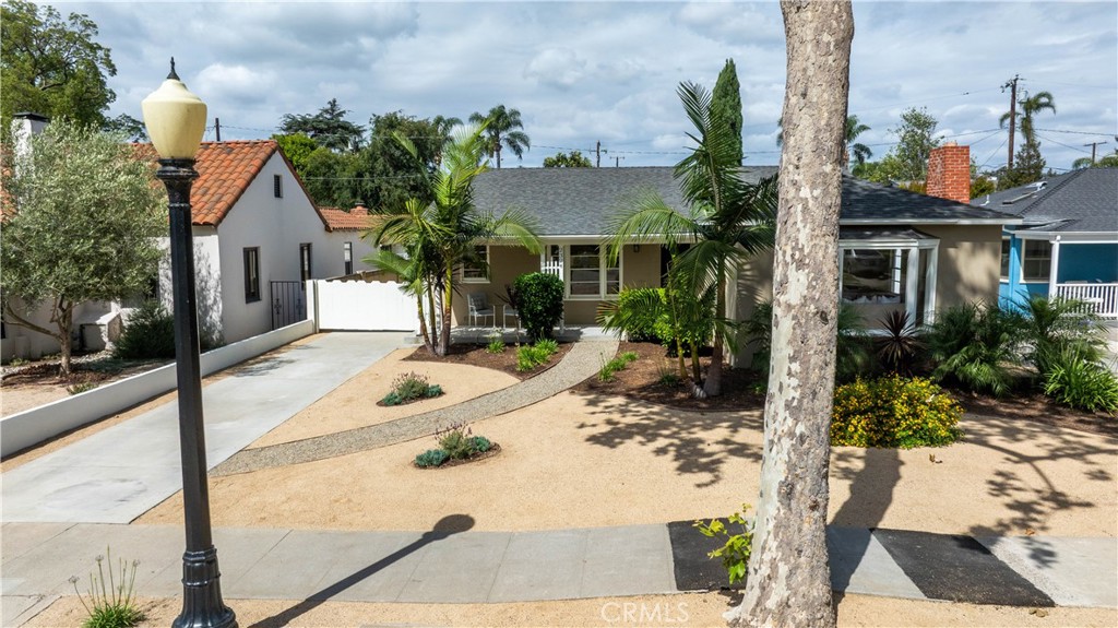 2324 North Riverside Drive Santa Ana, CA 92706 - Photo 50 of 52 a view of a house with backyard porch and sitting area