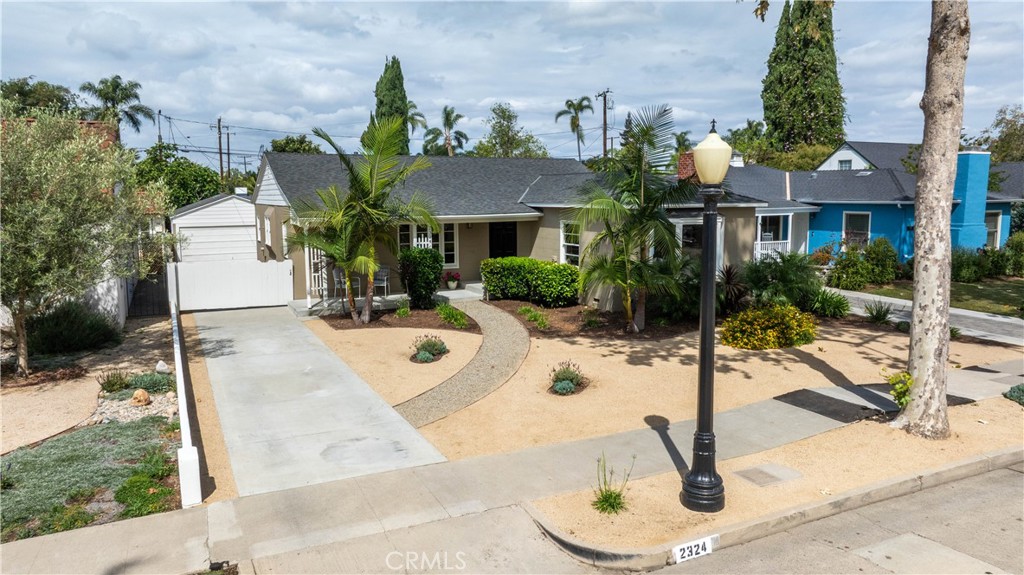 2324 North Riverside Drive Santa Ana, CA 92706 - Photo 52 of 52 a front view of house with yard