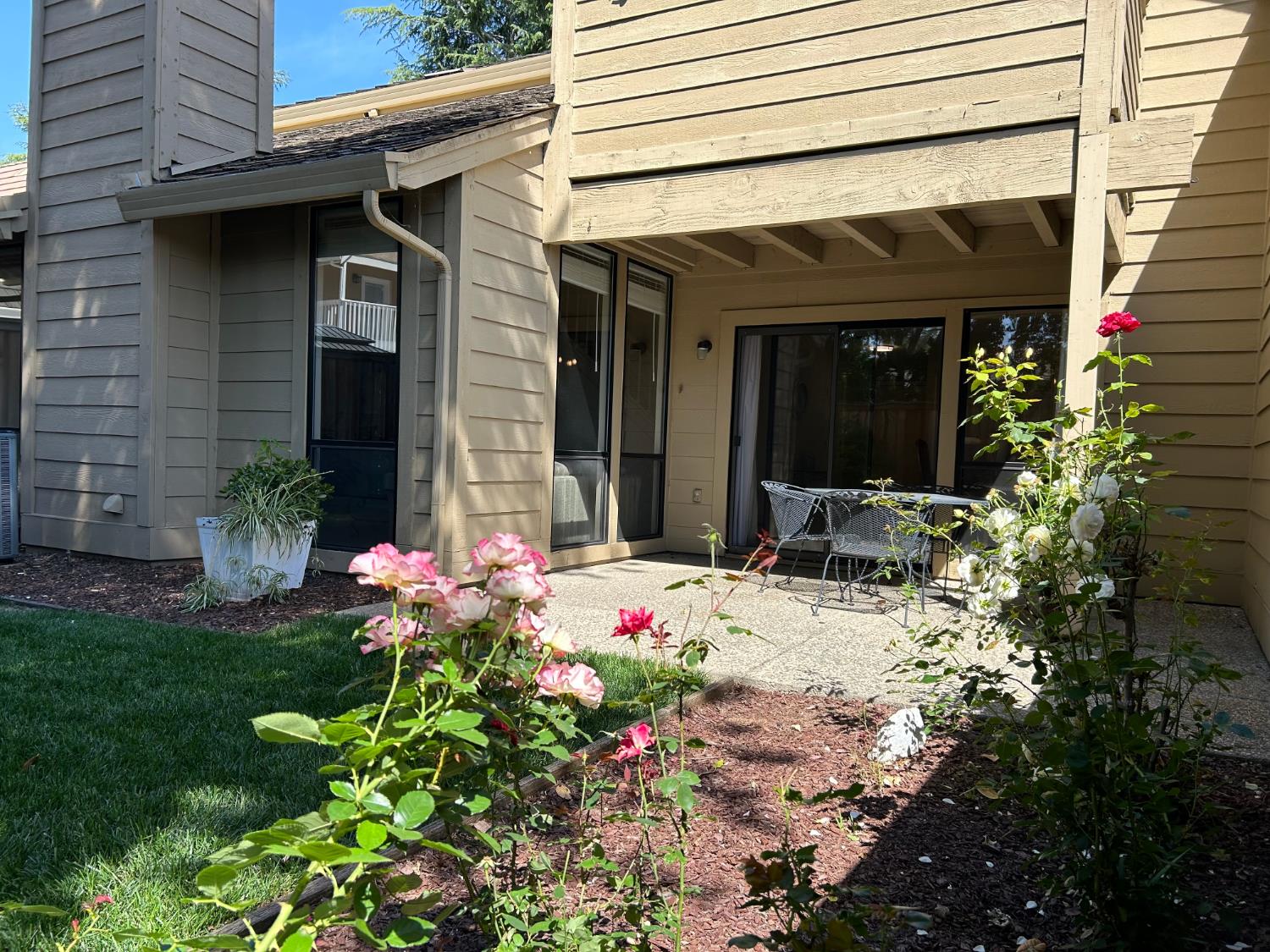 1067 Rio Cidade Way Sacramento, CA 95831 - Photo 23 of 33 a view of a house with potted plants