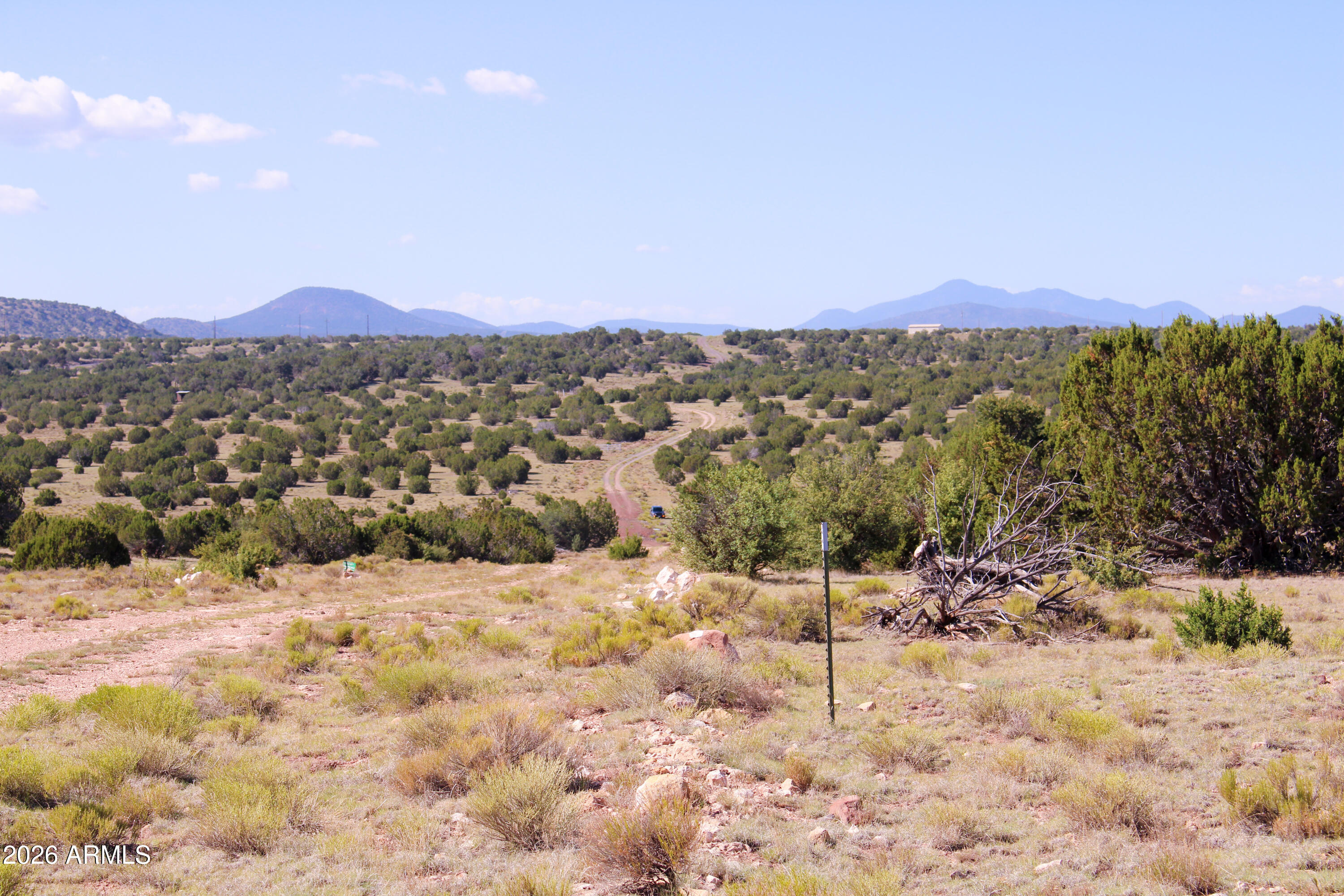 9360 Latigo Road Williams, AZ 86046 - Photo 1 of 16 a view of a town with mountains in the background