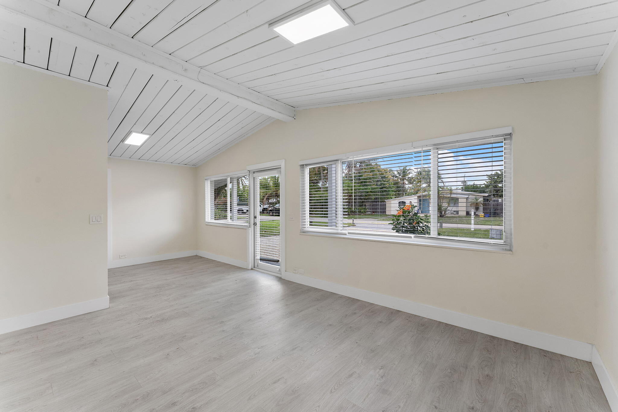 474 Enfield Street Boca Raton, FL 33487 - Photo 22 of 40 a view of an empty room with a window