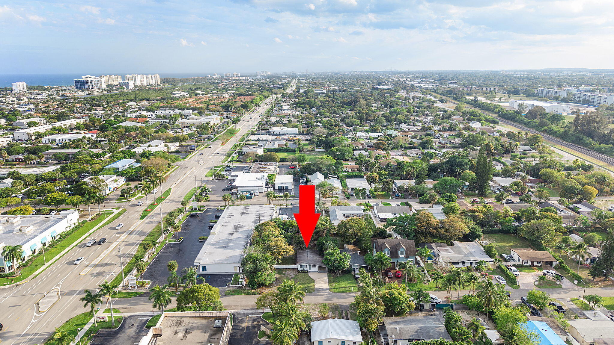 474 Enfield Street Boca Raton, FL 33487 - Photo 27 of 40 an aerial view of a city