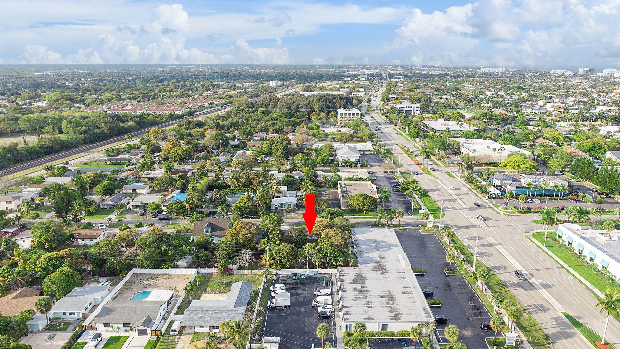 474 Enfield Street Boca Raton, FL 33487 - Photo 35 of 40 an aerial view of residential building and lake
