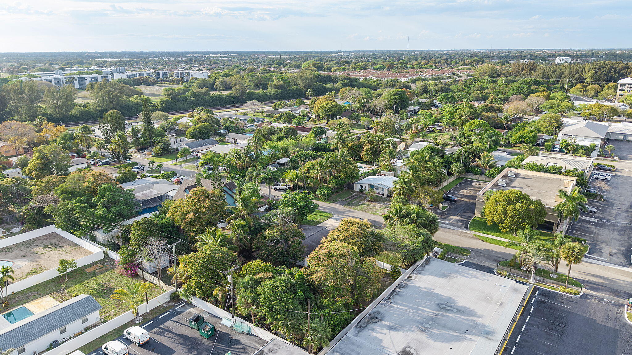 474 Enfield Street Boca Raton, FL 33487 - Photo 38 of 40 an aerial view of a city with lots of residential buildings