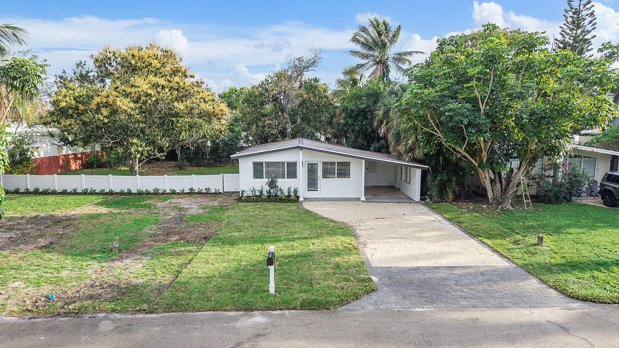 474 Enfield Street Boca Raton, FL 33487 - Photo 4 of 40 a front view of house with yard and green space