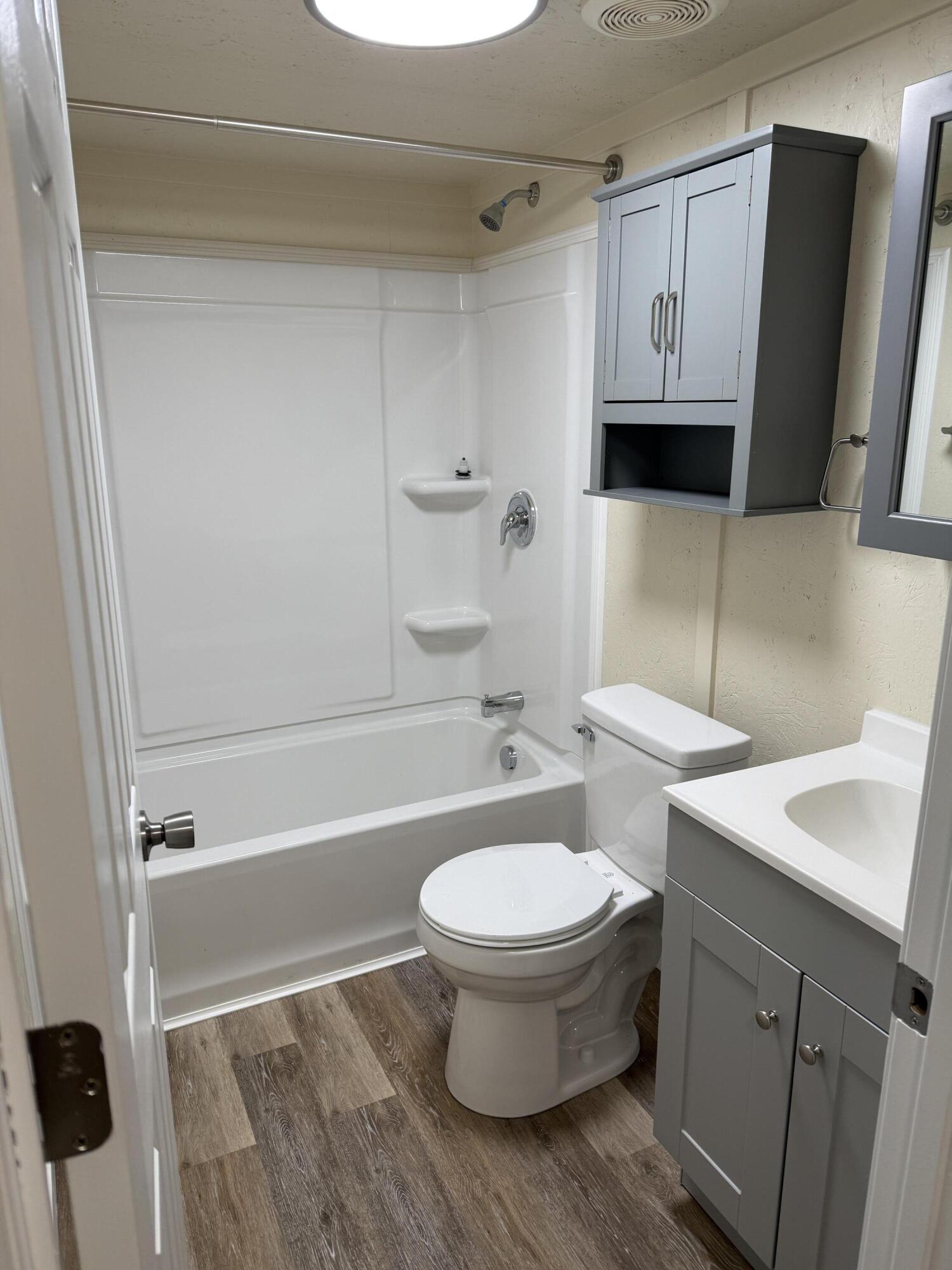 268 Briar Mountain Road Rocky Mount, VA 24151 - Photo 6 of 11 a bathroom with a sink toilet and shower