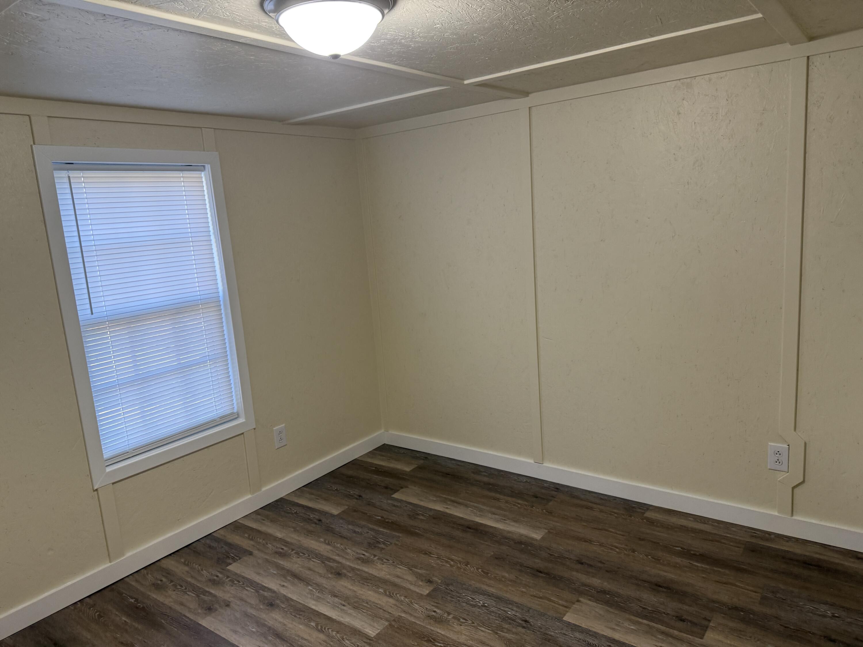 268 Briar Mountain Road Rocky Mount, VA 24151 - Photo 7 of 11 a view of a room with wooden floor and cabinet