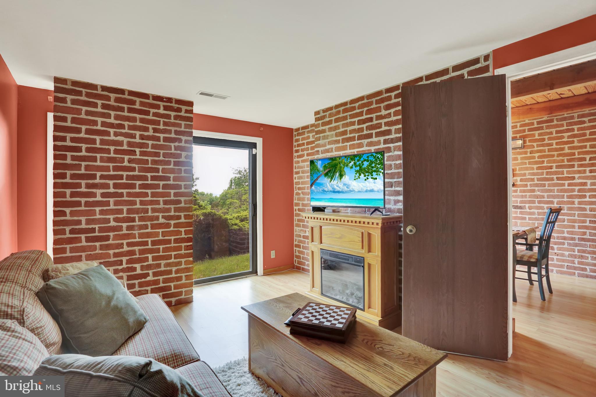 55 Karen Court Lititz, PA 17543 - Photo 16 of 36 a living room with furniture and a window