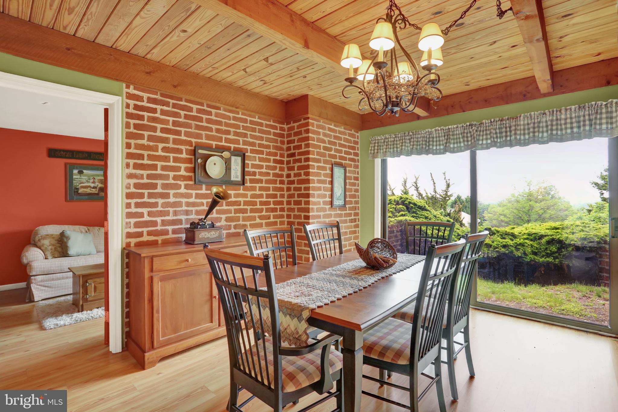 55 Karen Court Lititz, PA 17543 - Photo 8 of 36 a view of a dining room with furniture window and wooden floor