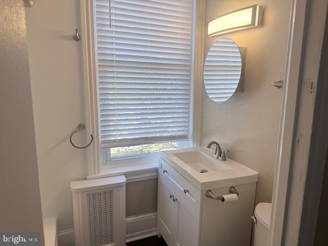 1223 North 29th Street, Unit 2F Philadelphia, PA 19121 - Photo 4 of 6 a bathroom with a sink and a mirror