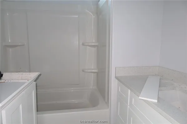 a bathroom with a tub