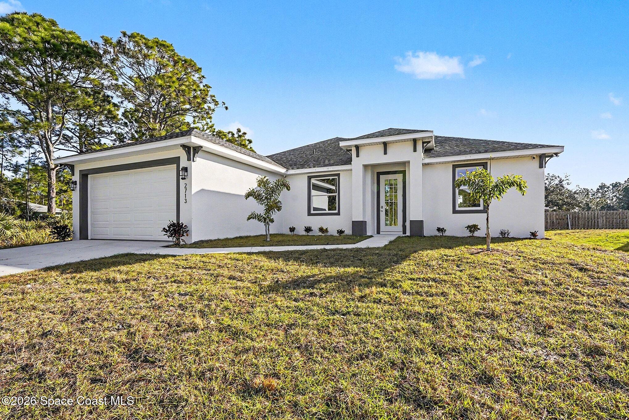 2713 Fields Avenue Southeast Palm Bay, FL 32909 - Photo 1 of 18 Front