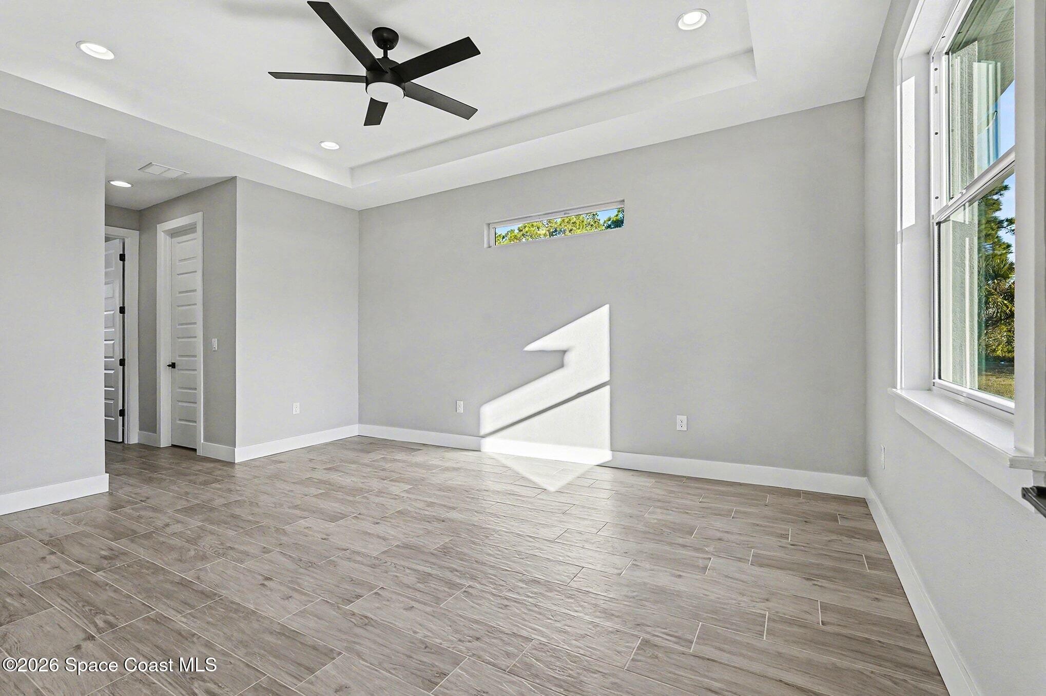 2713 Fields Avenue Southeast Palm Bay, FL 32909 - Photo 11 of 18 2725 Primary Bedroom