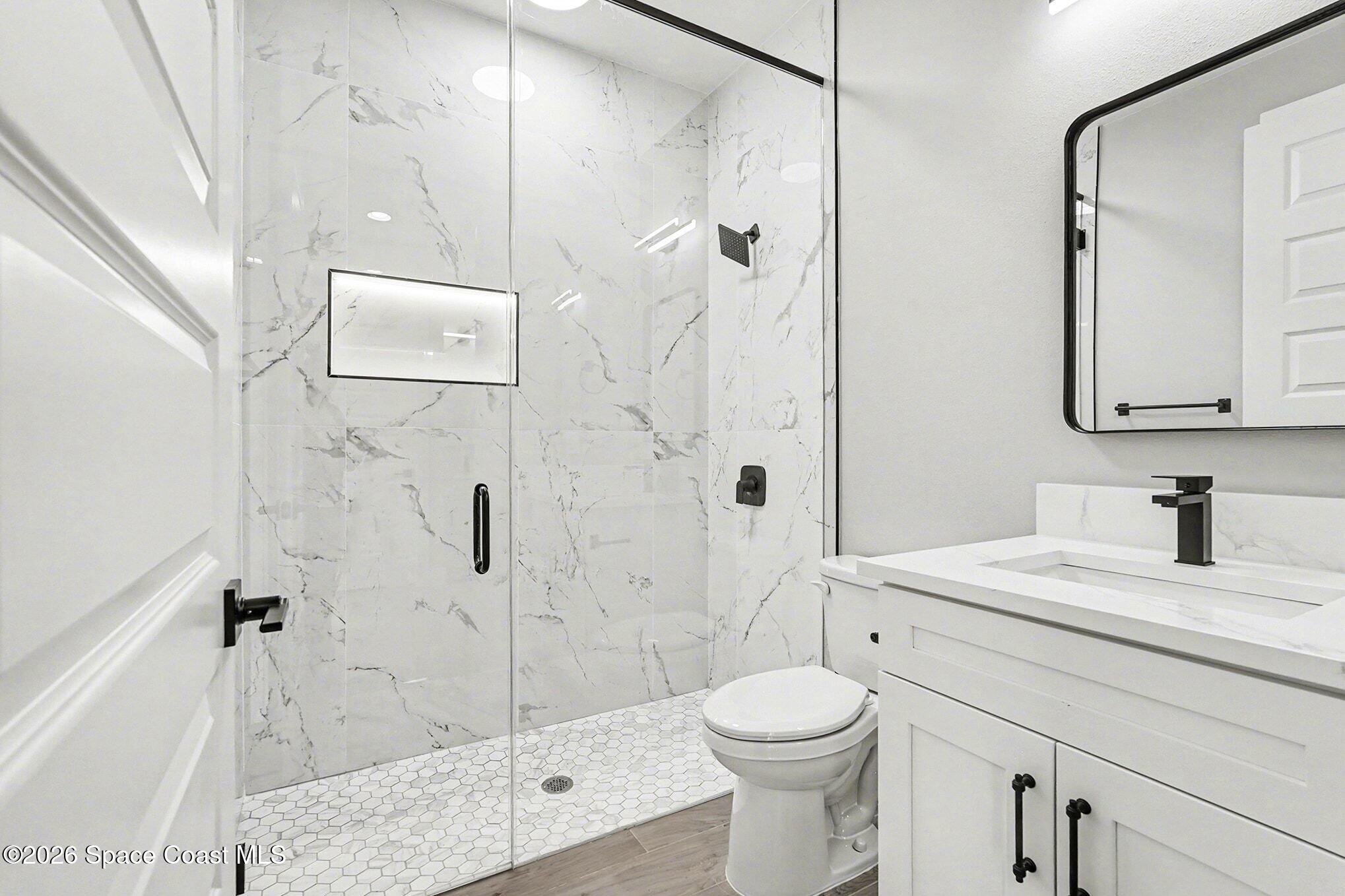 2713 Fields Avenue Southeast Palm Bay, FL 32909 - Photo 12 of 18 2725 Guest Bath 1