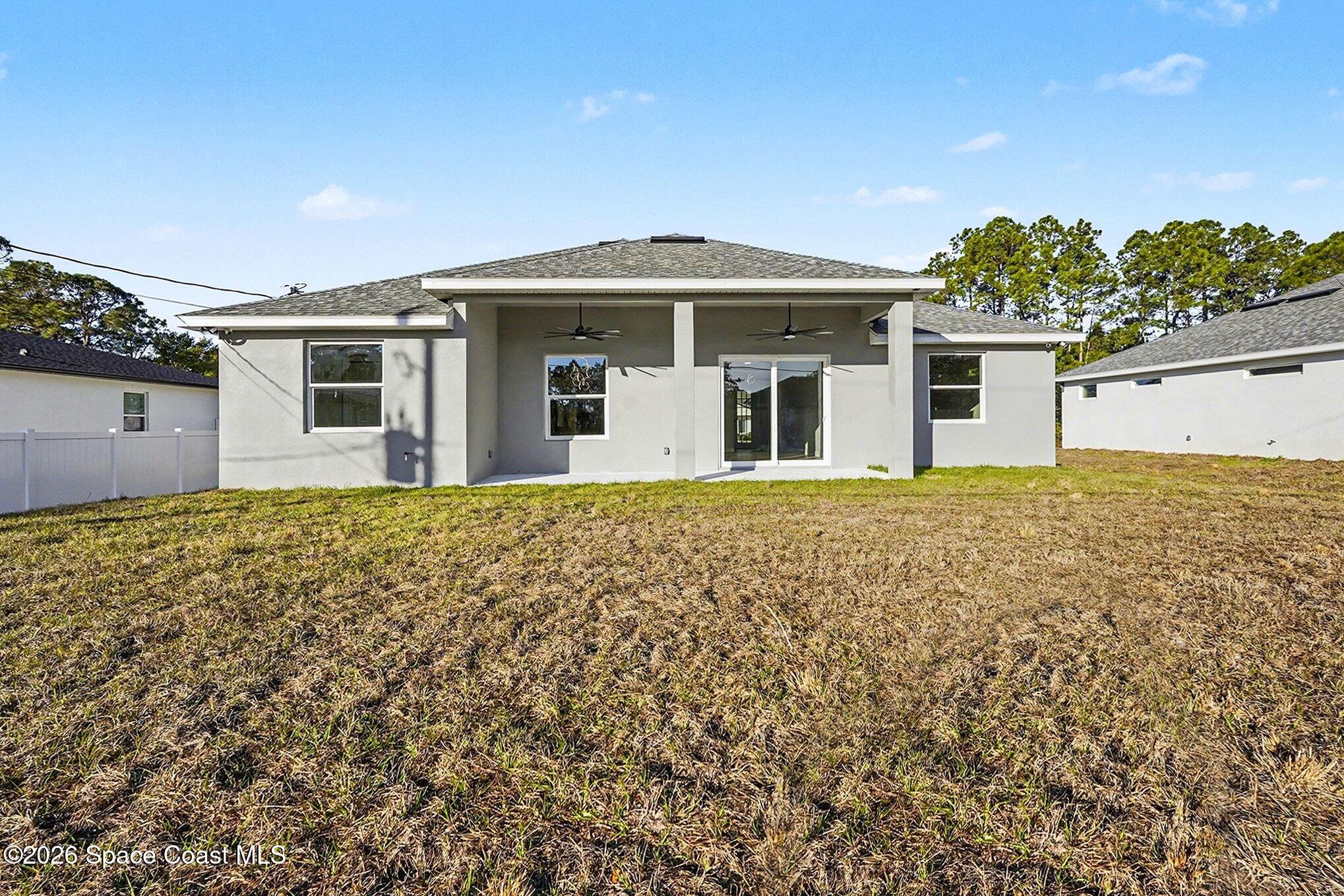 2713 Fields Avenue Southeast Palm Bay, FL 32909 - Photo 17 of 18 2725 Rear2