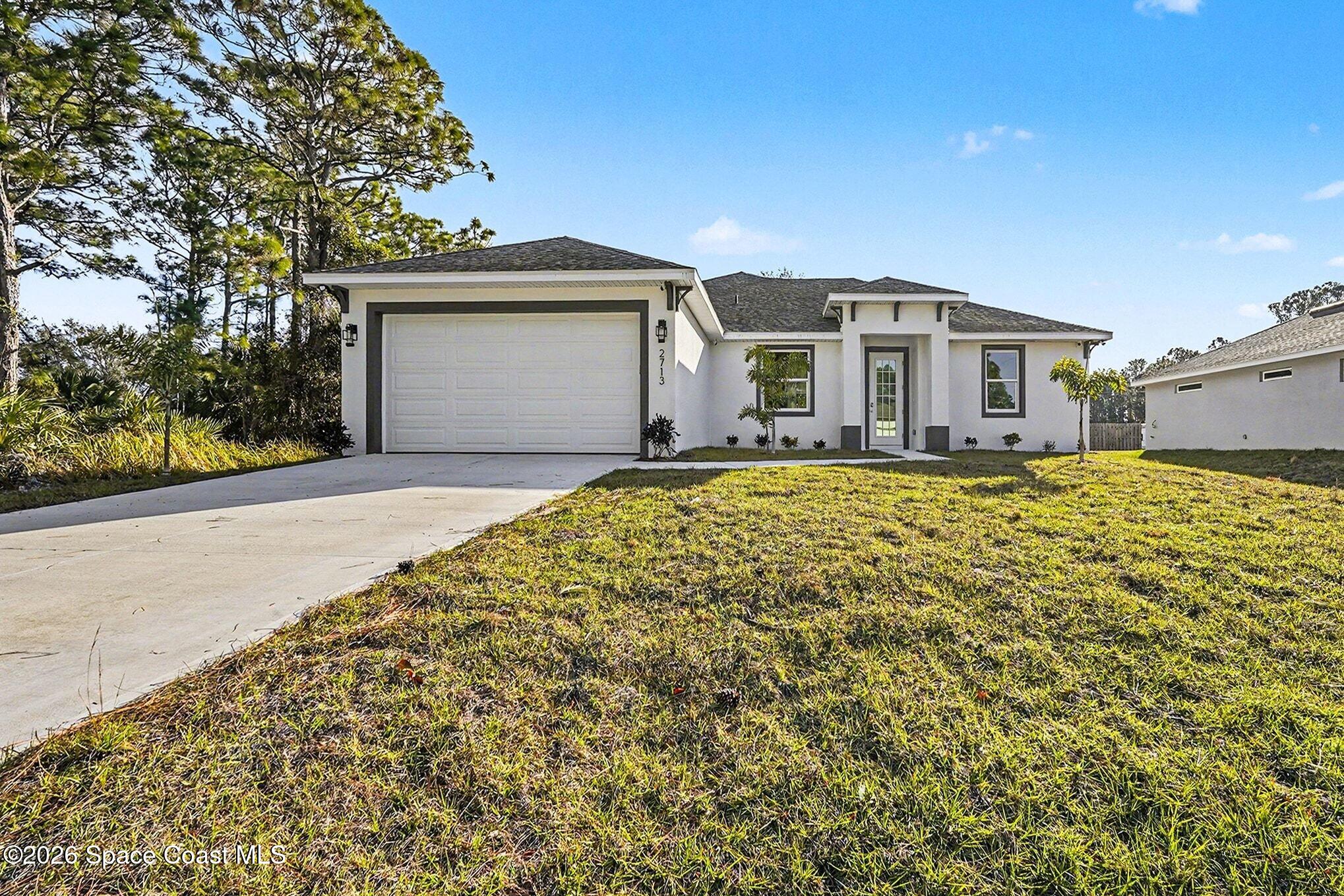 2713 Fields Avenue Southeast Palm Bay, FL 32909 - Photo 2 of 18 Front