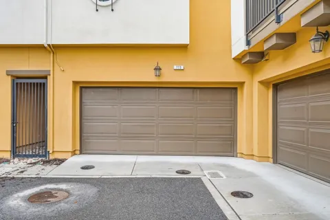 a front view of a house with a garage