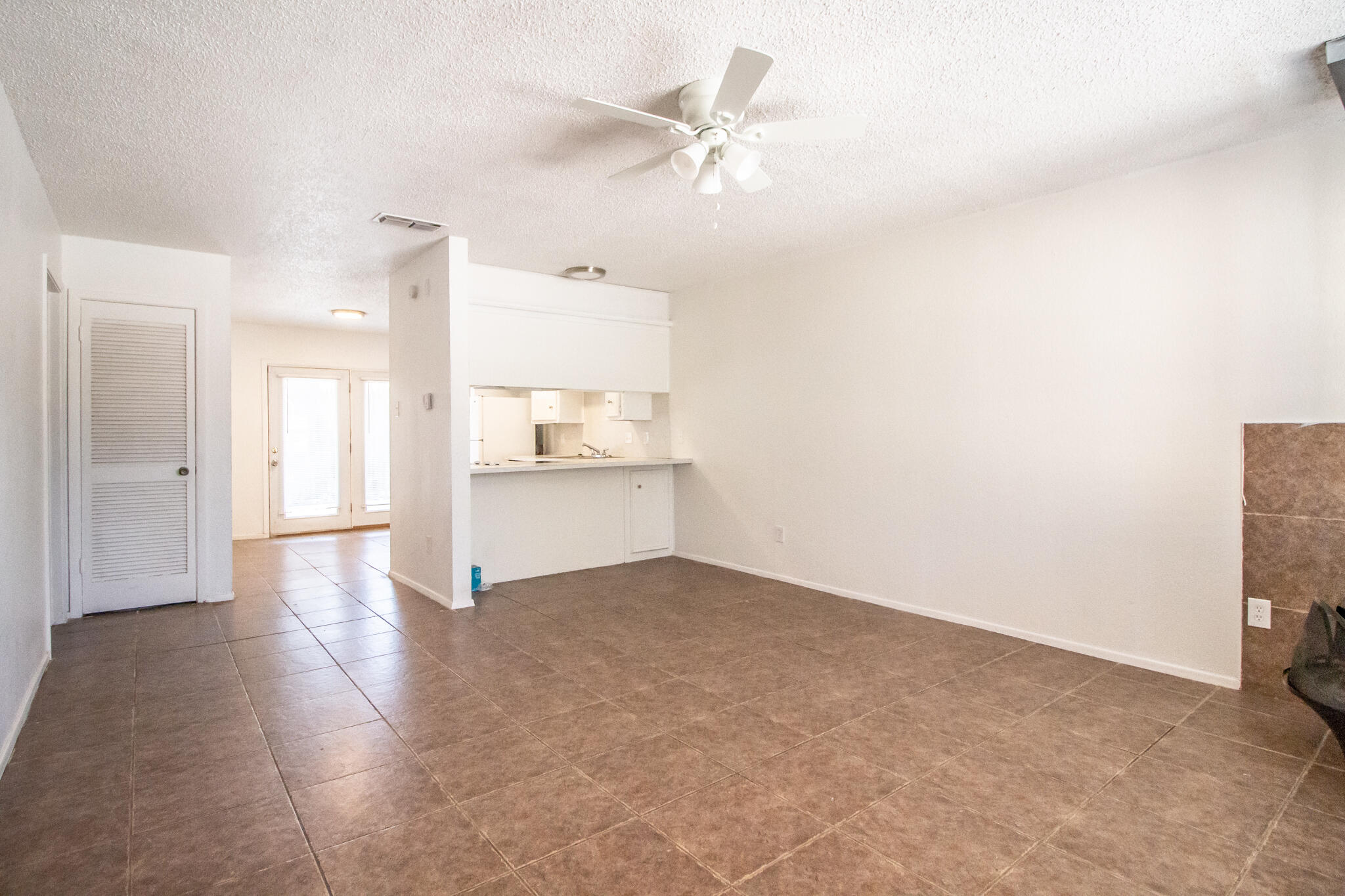 6103 38th Street, Unit B Lubbock, TX 79407 - Photo 3 of 11 a view of a kitchen with a sink and a cabinet