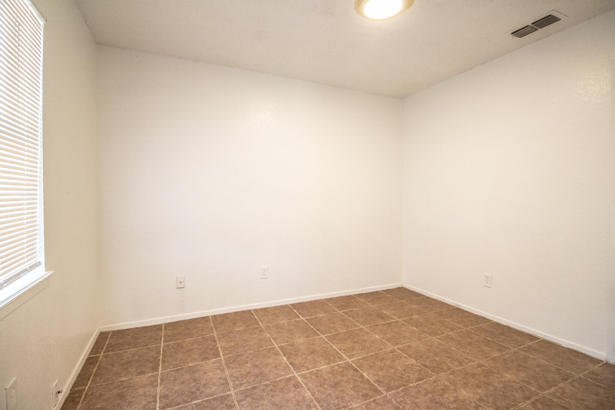 6103 38th Street, Unit B Lubbock, TX 79407 - Photo 6 of 11 a view of empty room