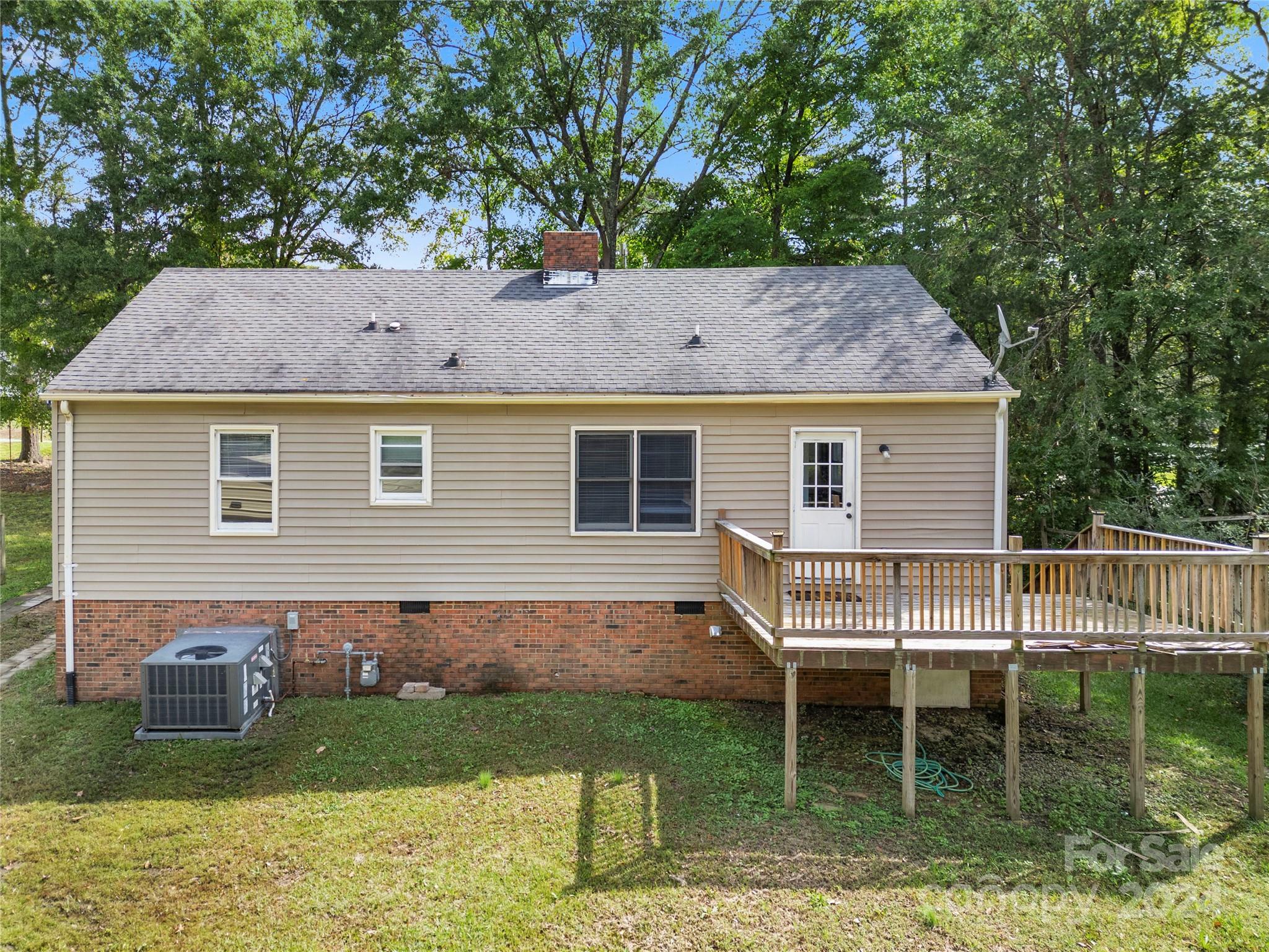 8101 Plott Road Charlotte, NC 28215 - Photo 26 of 34 a house view with a garden space