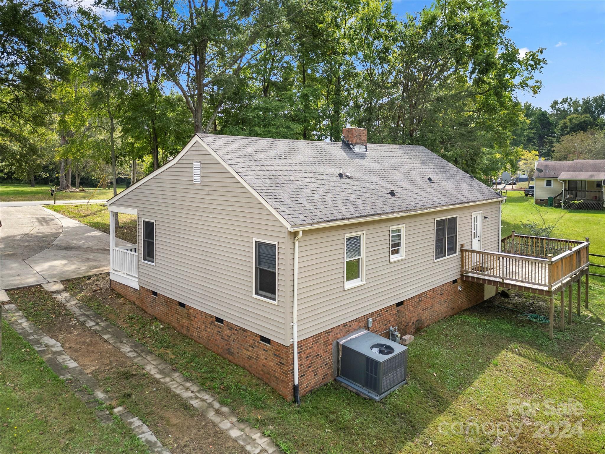 8101 Plott Road Charlotte, NC 28215 - Photo 27 of 34 a view of a house with a yard