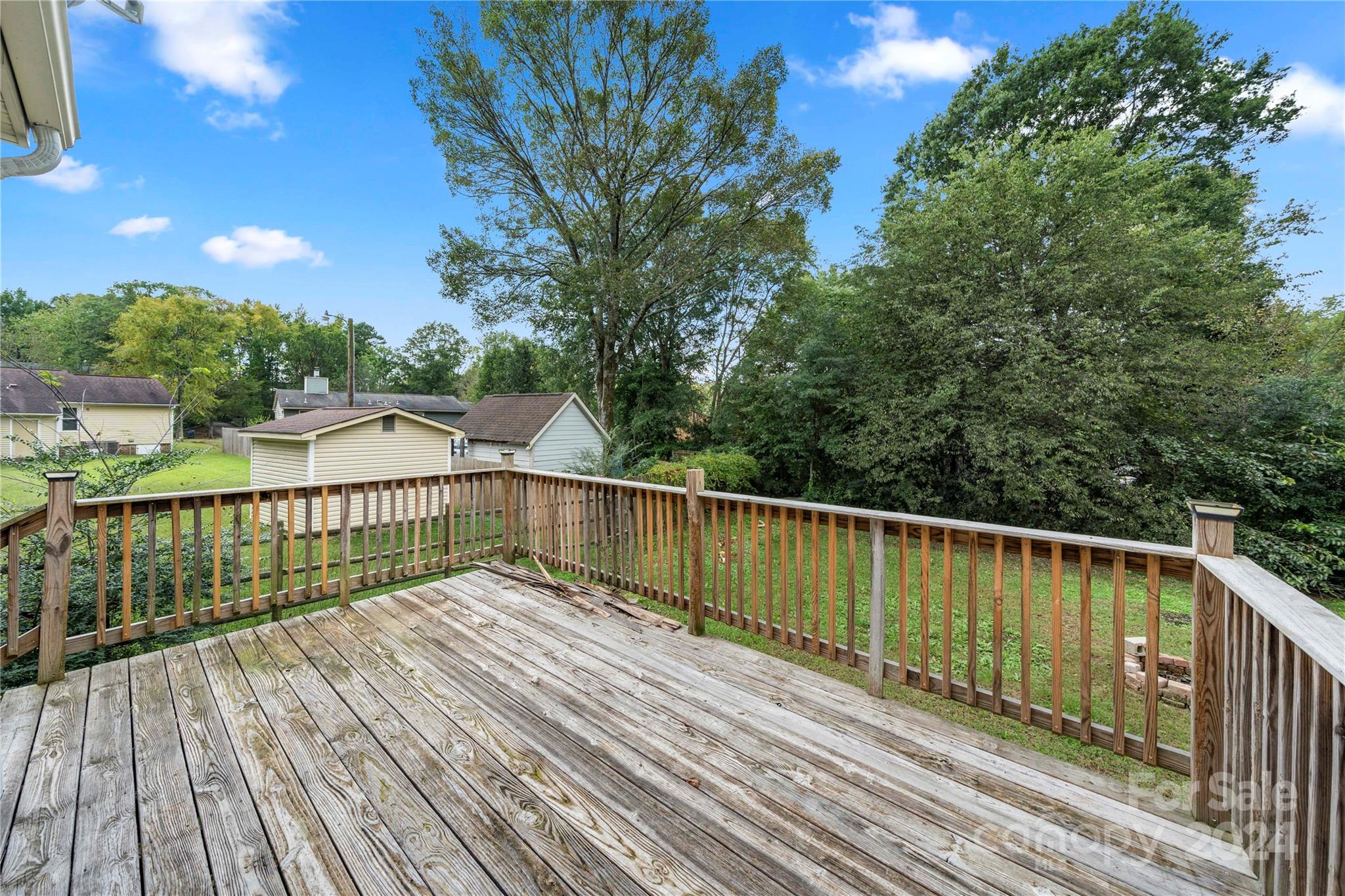 8101 Plott Road Charlotte, NC 28215 - Photo 29 of 34 a view of balcony with wooden floor and fence