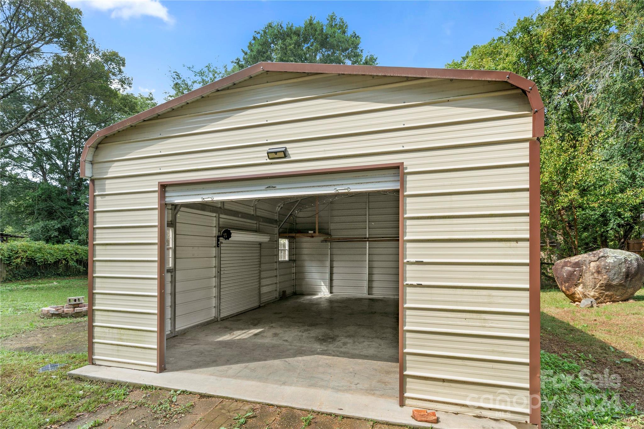 8101 Plott Road Charlotte, NC 28215 - Photo 30 of 34 a view of a house with a garage