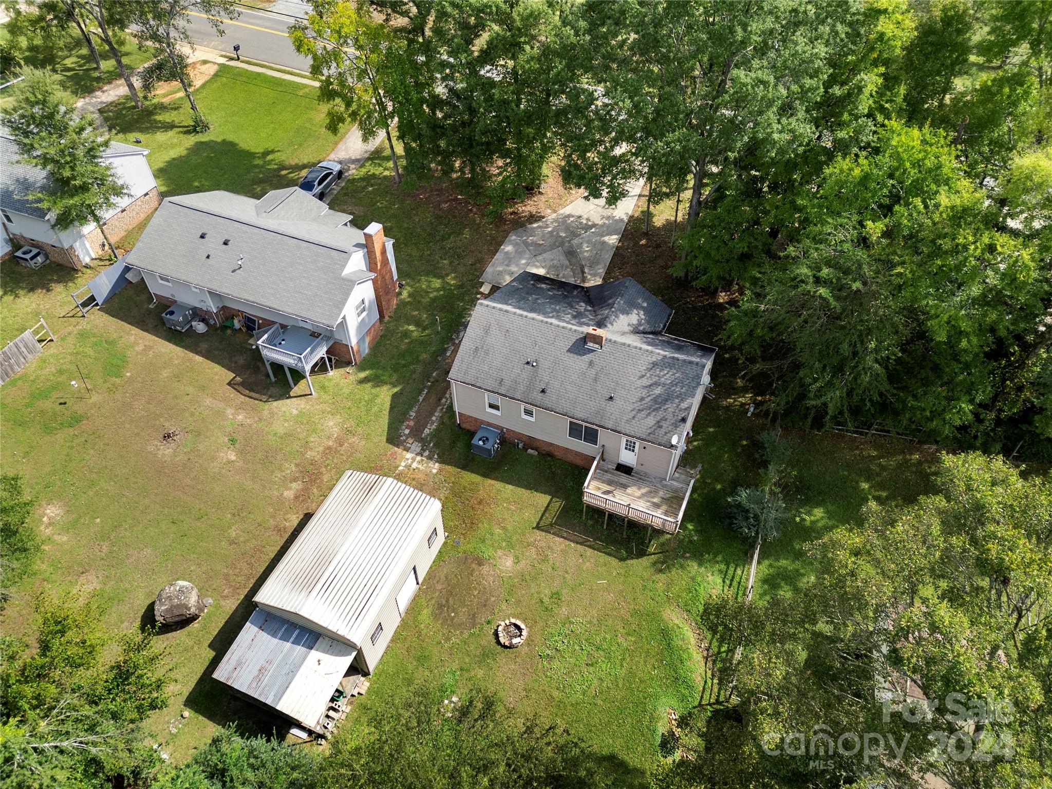 8101 Plott Road Charlotte, NC 28215 - Photo 34 of 34 an aerial view of a house with a garden