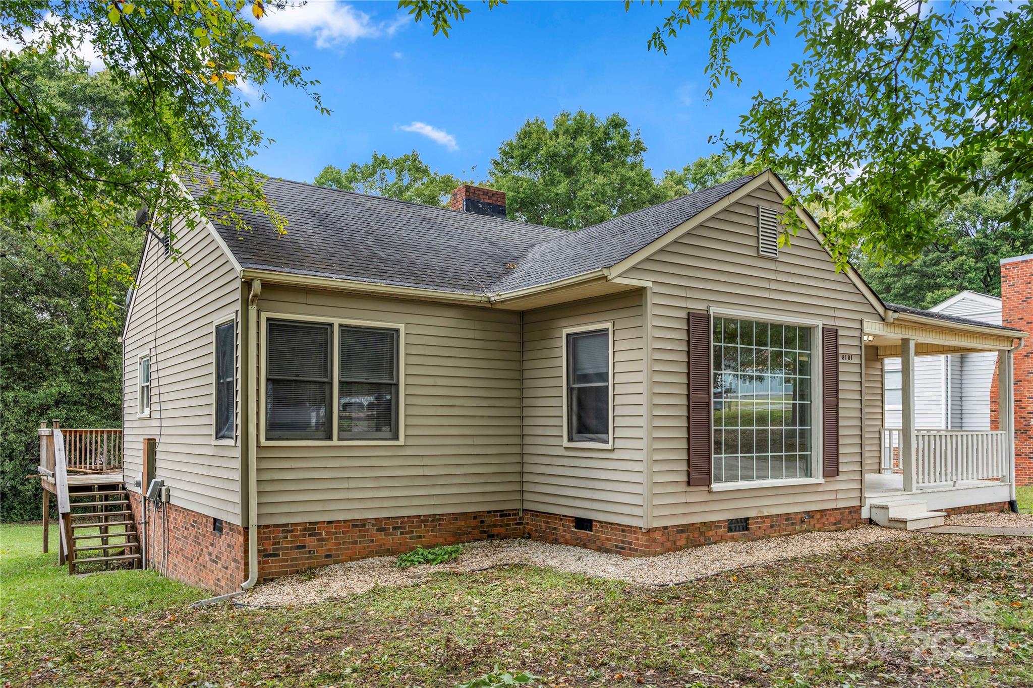 8101 Plott Road Charlotte, NC 28215 - Photo 4 of 34 a view of a house with a yard